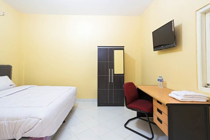 Imagen de la habitación del Reddoorz Plus Near Halim Perdanakusuma 2. Foto 33