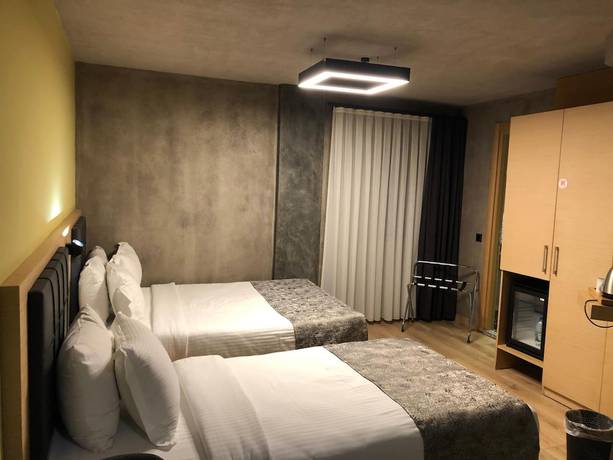Imagen de la habitación del Redstone Hotel. Foto 10
