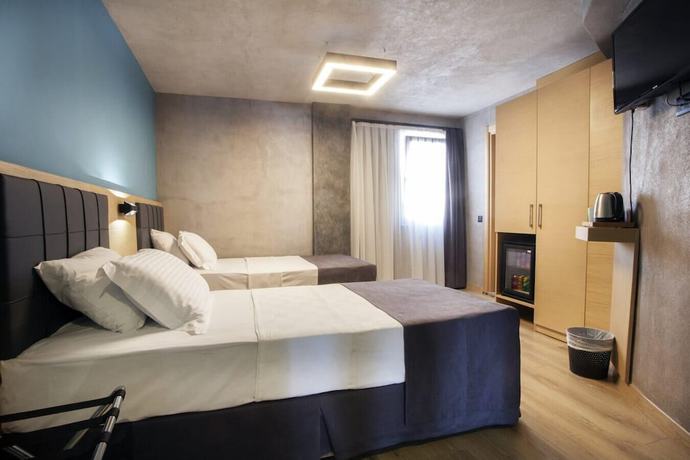 Imagen de la habitación del Redstone Hotel. Foto 11