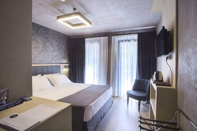 Imagen de la habitación del Redstone Hotel. Foto 13