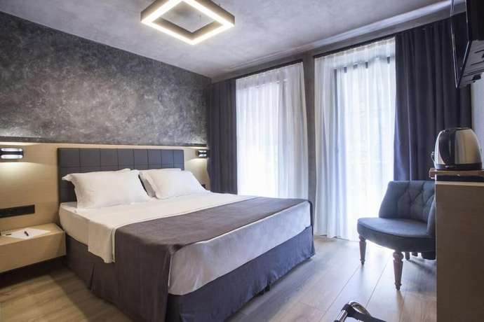 Imagen de la habitación del Redstone Hotel. Foto 14