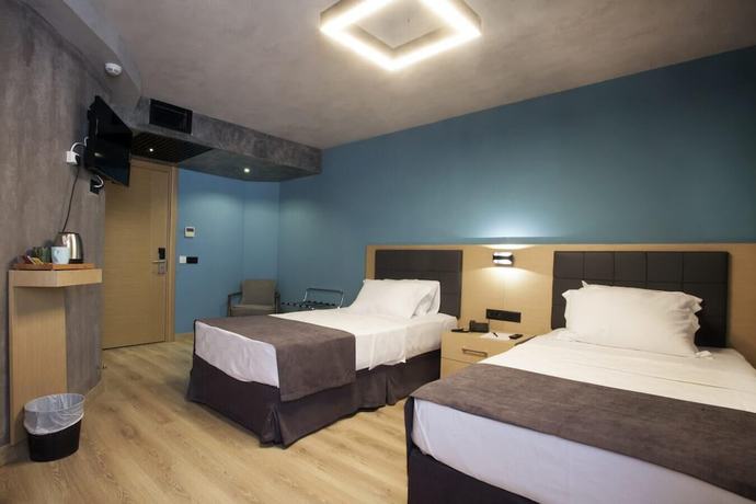 Imagen de la habitación del Redstone Hotel. Foto 18