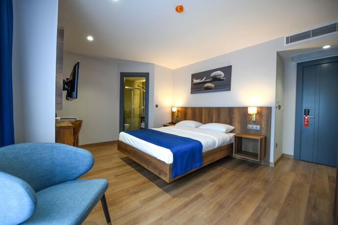Imagen de la habitación del Ref Inn Hotel. Foto 18