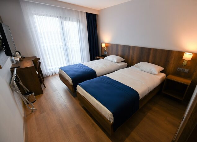 Imagen de la habitación del Ref Inn Hotel. Foto 19