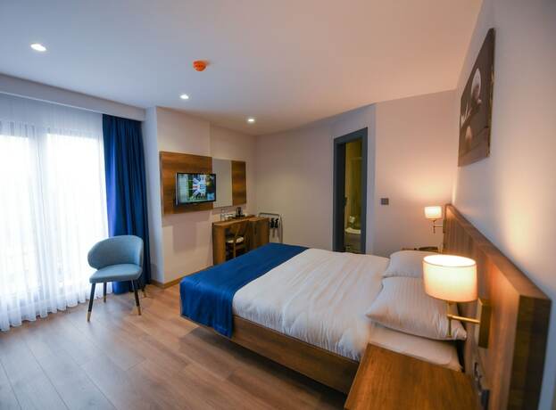 Imagen de la habitación del Ref Inn Hotel. Foto 20