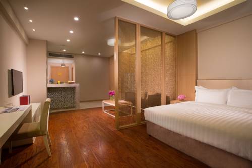 Imagen de la habitación del Regal Kangbo Hotel & Residence. Foto 1