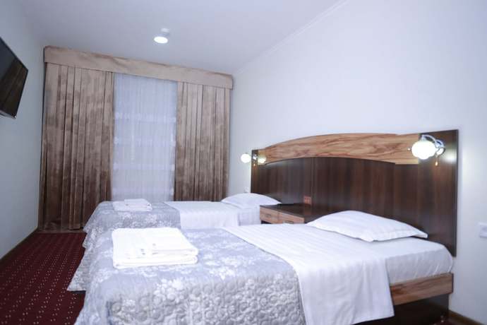 Imagen de la habitación del Reikartz Surxon Termez. Foto 10