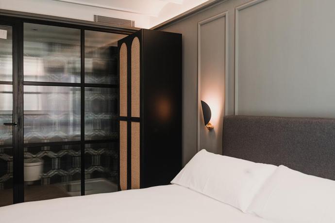 Imagen de la habitación del Reina 107 Beach Boutique. Foto 2