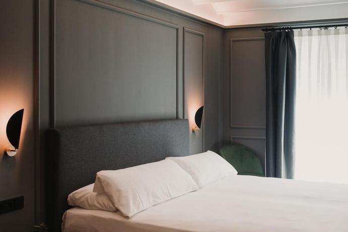 Imagen de la habitación del Reina 107 Beach Boutique. Foto 3