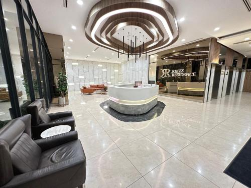 Imagen de la habitación del Reizz Residence by Perkasa. Foto 18