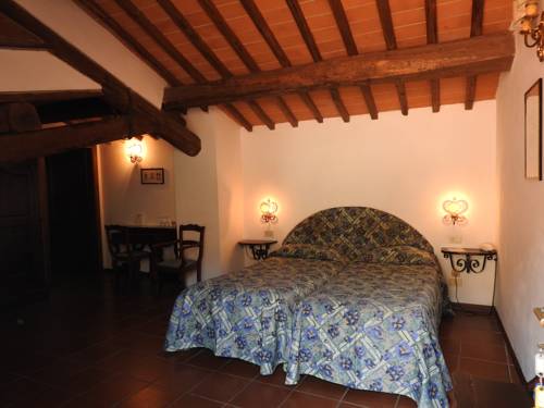 Imagen de la habitación del Relais Borgo Di Toiano. Foto 9