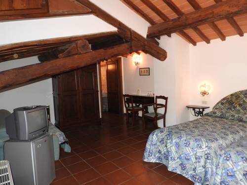 Imagen de la habitación del Relais Borgo Di Toiano. Foto 11