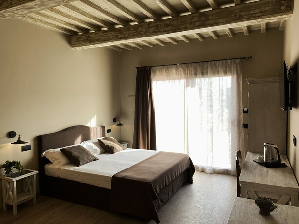 Imagen de la habitación del Relais Campiglioni. Foto 16