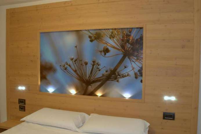 Imagen de la habitación del Relais Fior di Bosco. Foto 17