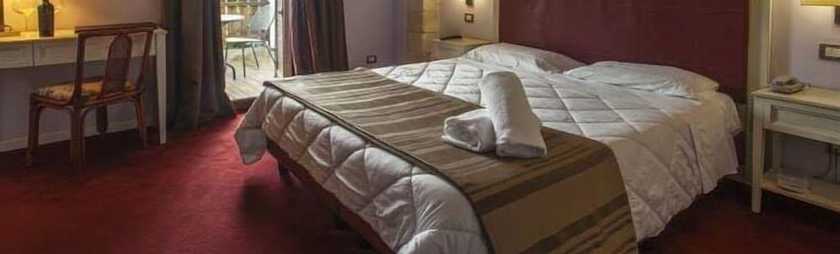 Imagen de la habitación del Relais La Fontanina. Foto 14