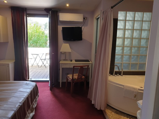 Imagen de la habitación del Relais La Fontanina. Foto 17