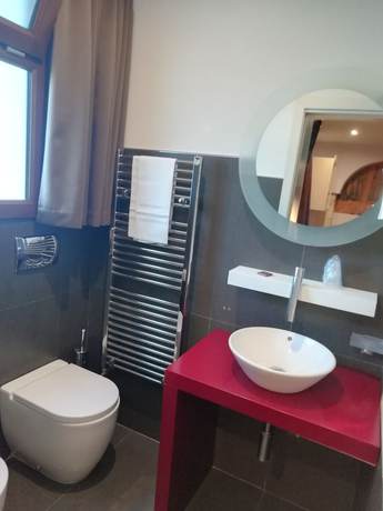 Imagen de la habitación del Relais La Fontanina. Foto 19