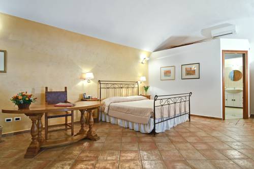 Imagen de la habitación del Relais Le Clarisse. Foto 10