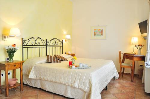 Imagen de la habitación del Relais Le Clarisse. Foto 13