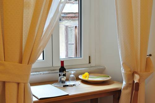 Imagen de la habitación del Relais Le Clarisse. Foto 16