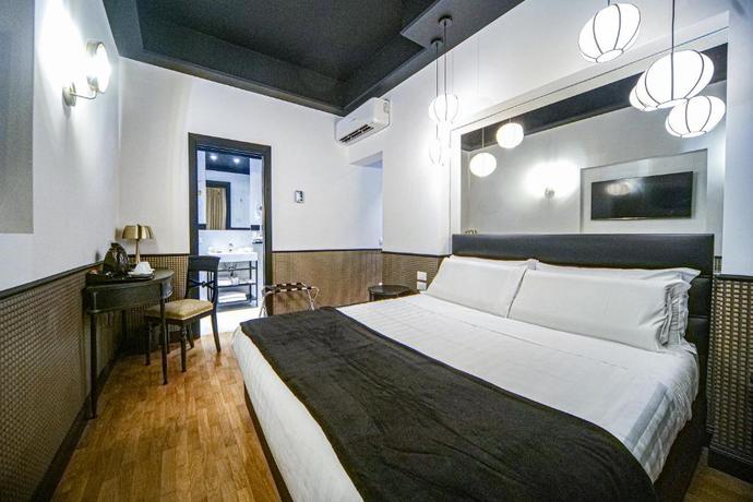 Imagen de la habitación del Relais Luxury Corso. Foto 4