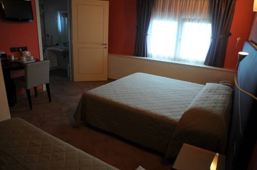 Imagen de la habitación del Relais Magione Papale. Foto 3