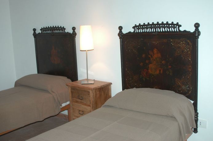 Imagen de la habitación del Relais Parco Cavalonga. Foto 10