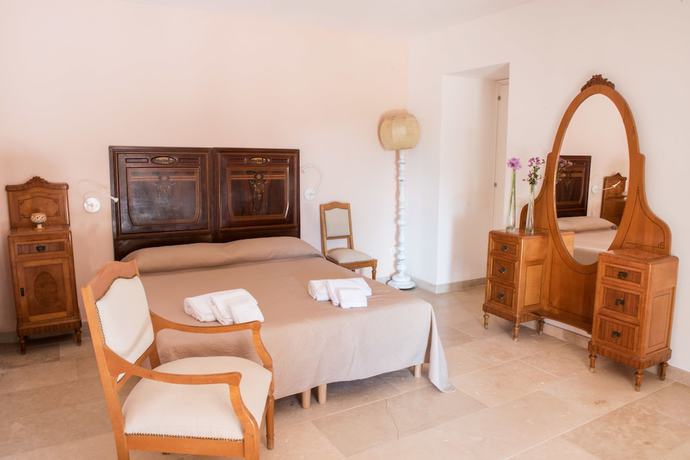Imagen de la habitación del Relais Parco Cavalonga. Foto 11