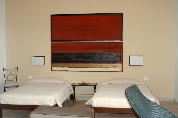 Imagen de la habitación del Relais Parco Cavalonga. Foto 15