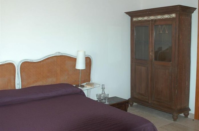 Imagen de la habitación del Relais Parco Cavalonga. Foto 19