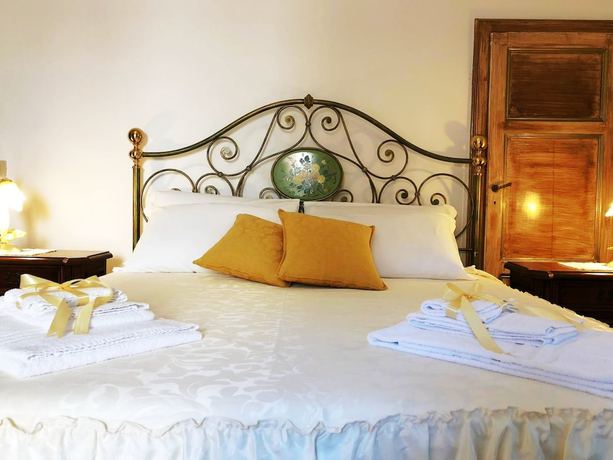 Imagen de la habitación del Relais Puccini. Foto 9