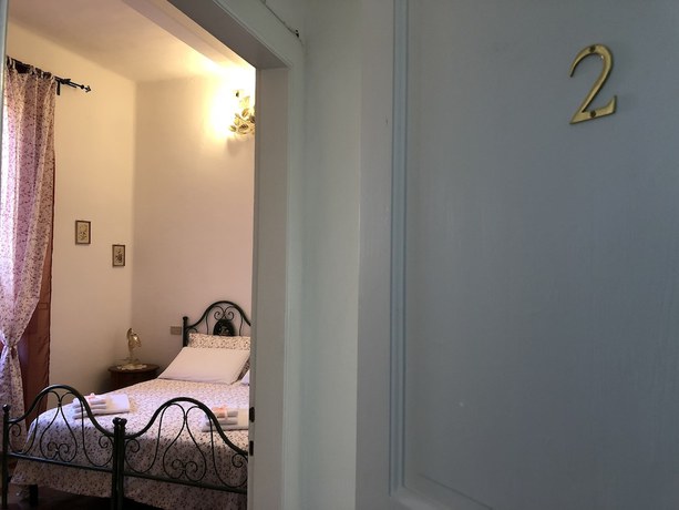 Imagen de la habitación del Relais Puccini. Foto 10