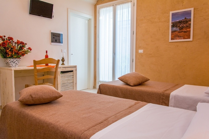 Imagen de la habitación del Relais Tenuta Camp&igrave;. Foto 5