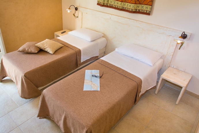 Imagen de la habitación del Relais Tenuta Camp&igrave;. Foto 8