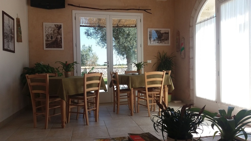 Imagen de los interiores del Relais Tenuta Camp&igrave;. Foto 18