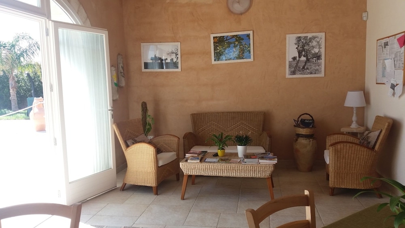 Imagen de los interiores del Relais Tenuta Camp&igrave;. Foto 19