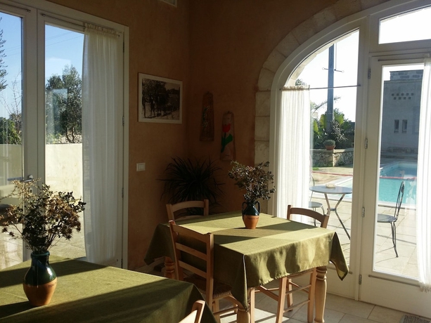 Imagen de la habitación del Relais Tenuta Camp&igrave;. Foto 11