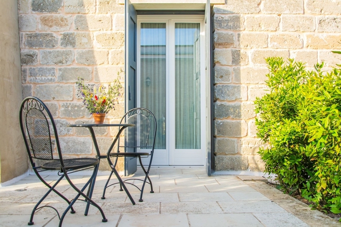 Imagen de la habitación del Relais Tenuta Camp&igrave;. Foto 13