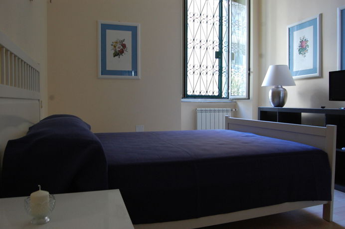 Imagen de la habitación del Relais Villa Fiorelli. Foto 9