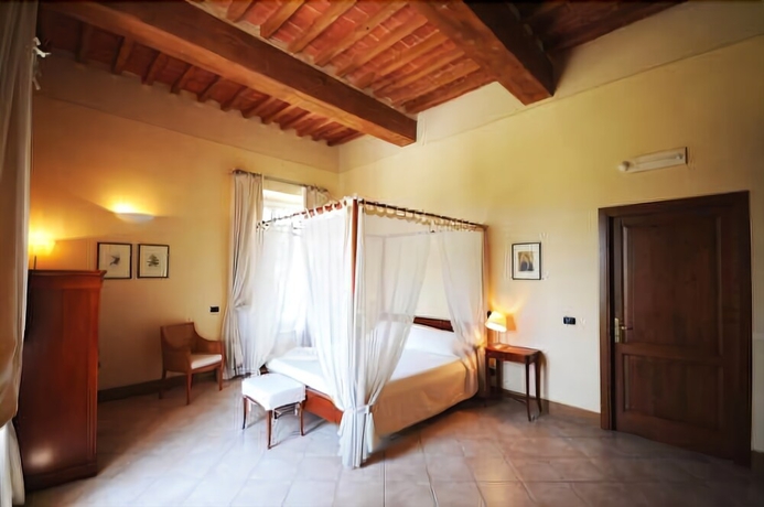 Imagen de la habitación del Relais Villa Grazianella - Una Esperienze. Foto 11