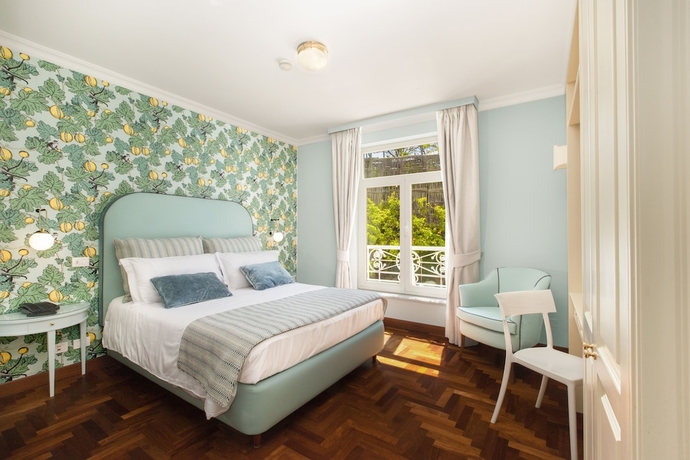 Imagen de la habitación del Relais Villa Savarese. Foto 10