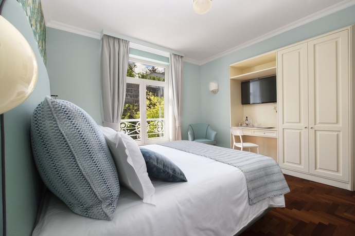 Imagen de la habitación del Relais Villa Savarese. Foto 11