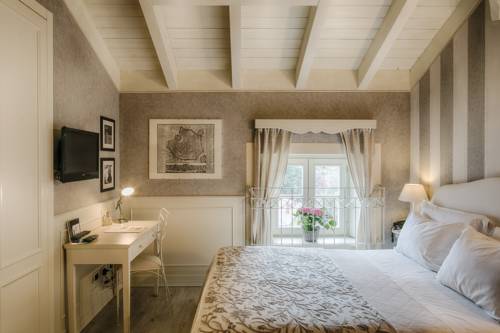 Imagen de la habitación del Relais Villa Vittoria. Foto 6