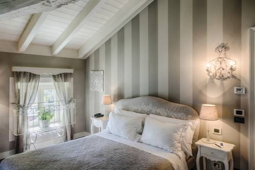 Imagen de la habitación del Relais Villa Vittoria. Foto 11