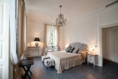 Imagen de la habitación del Relais Villa Vittoria. Foto 13