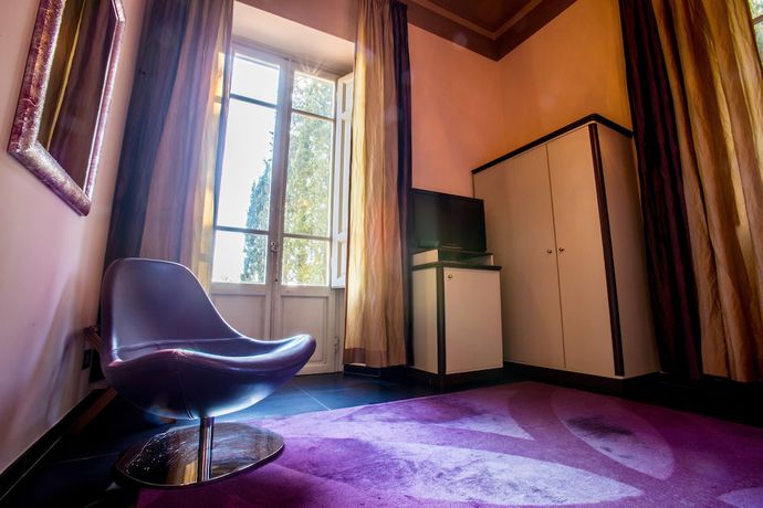 Imagen de la habitación del Relais Villa al Vento. Foto 7