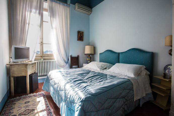 Imagen de la habitación del Relais Villa al Vento. Foto 18