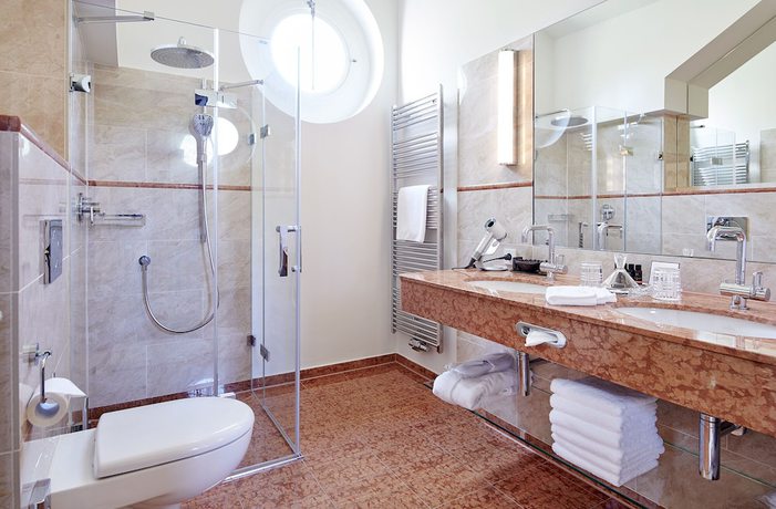 Imagen de la habitación del Relais and Chateaux Hotel Hohenhaus. Foto 11