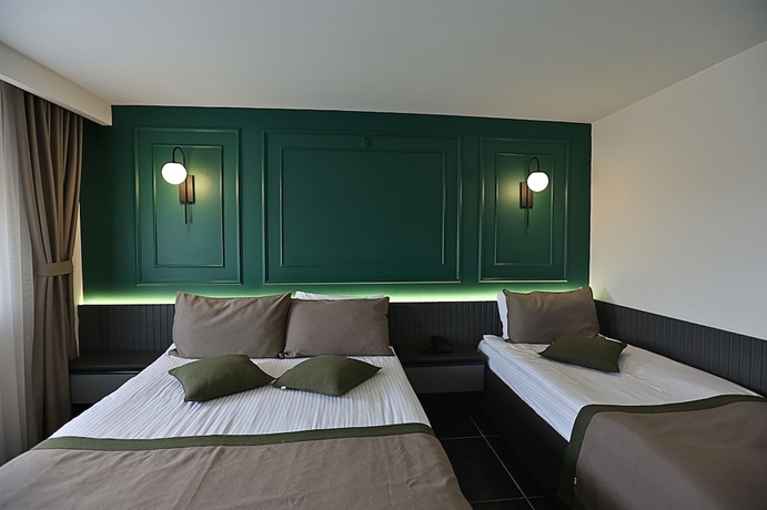 Imagen de la habitación del Ren Business Hotel. Foto 2
