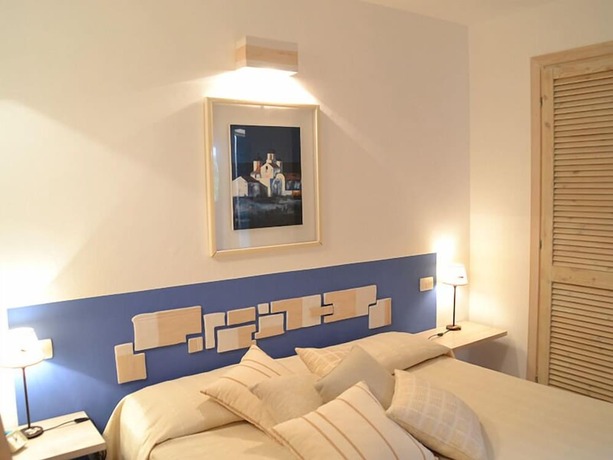 Imagen de la habitación del Rena Bianca Cugnana Verde Residence. Foto 20